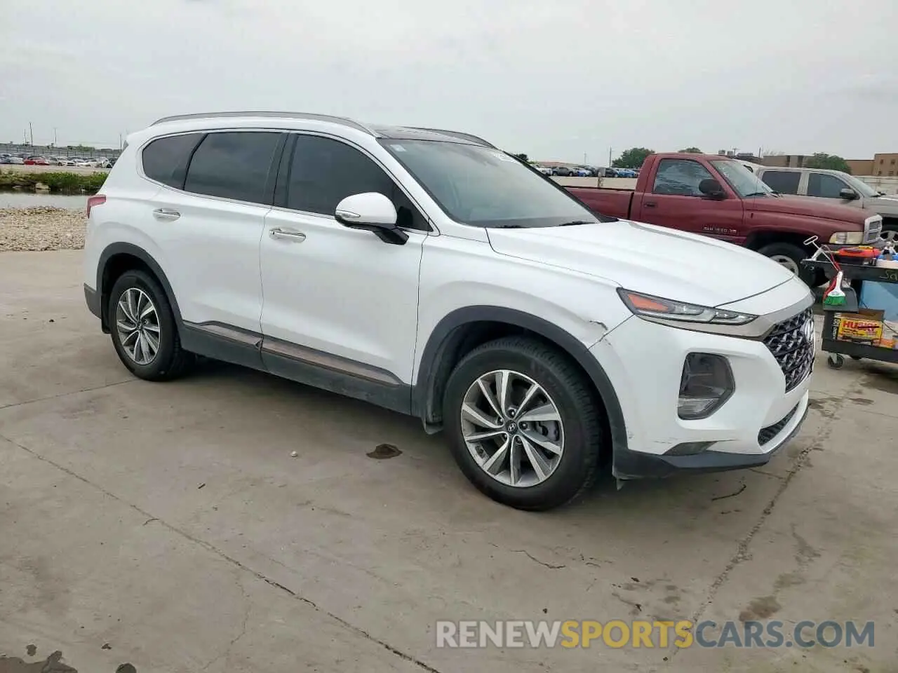 4 Photograph of a damaged car 5NMS53AD7LH231060 HYUNDAI SANTA FE 2020