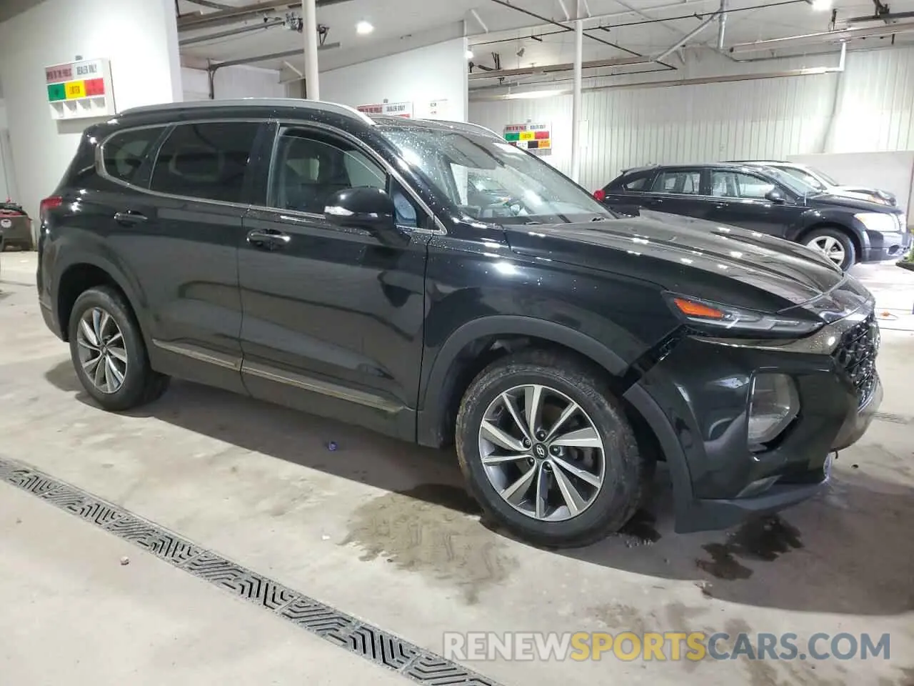 4 Photograph of a damaged car 5NMS5CAD9LH185215 HYUNDAI SANTA FE 2020