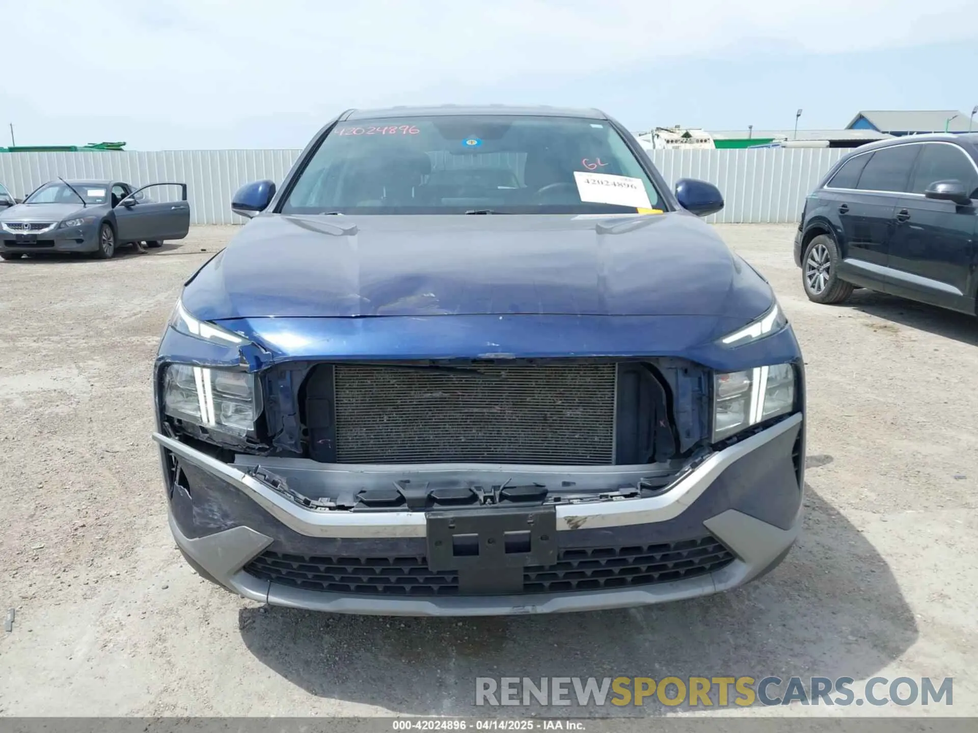 12 Photograph of a damaged car 5NMS14AJ2MH339403 HYUNDAI SANTA FE 2021