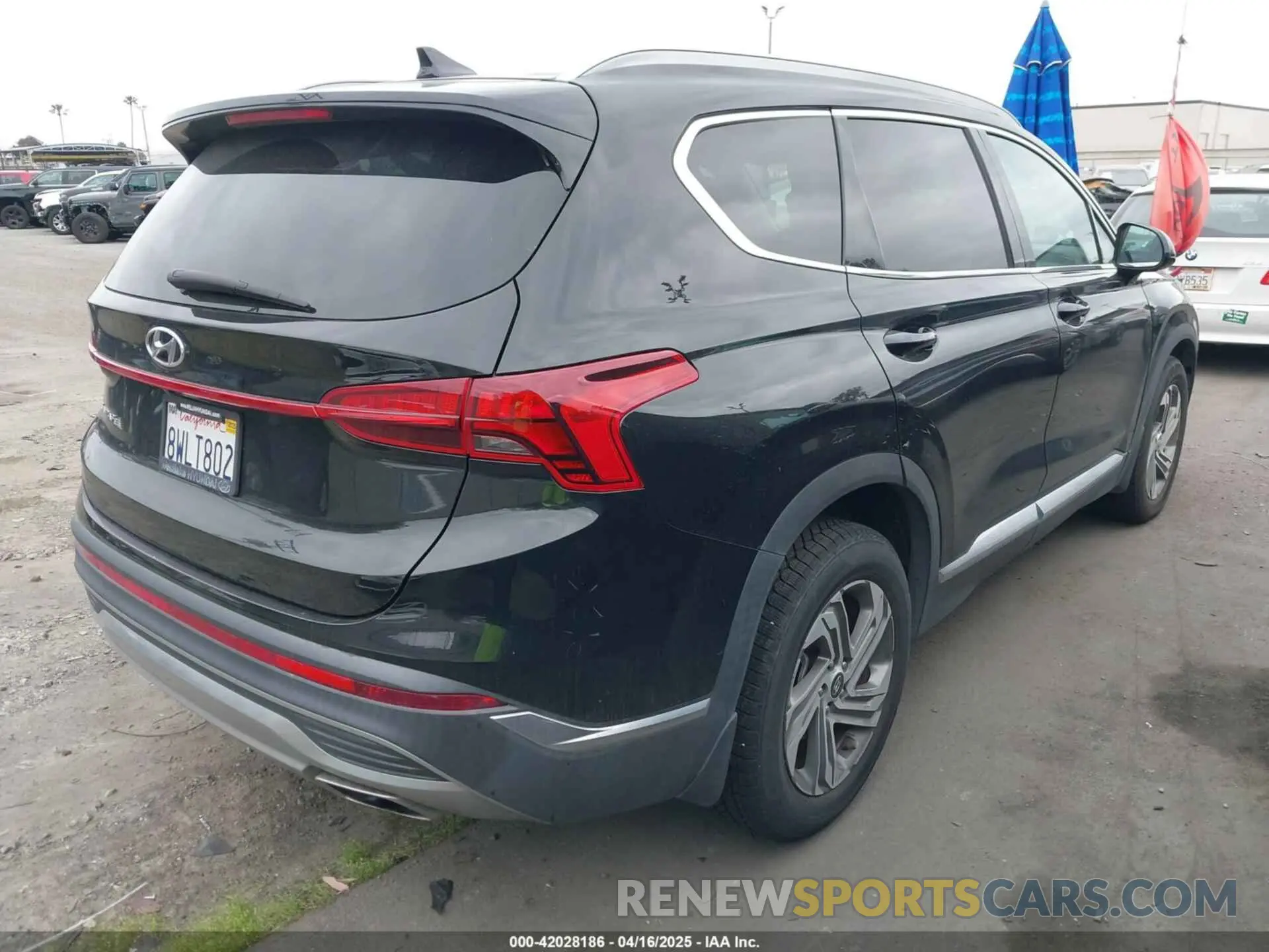 4 Photograph of a damaged car 5NMS24AJ8MH331836 HYUNDAI SANTA FE 2021