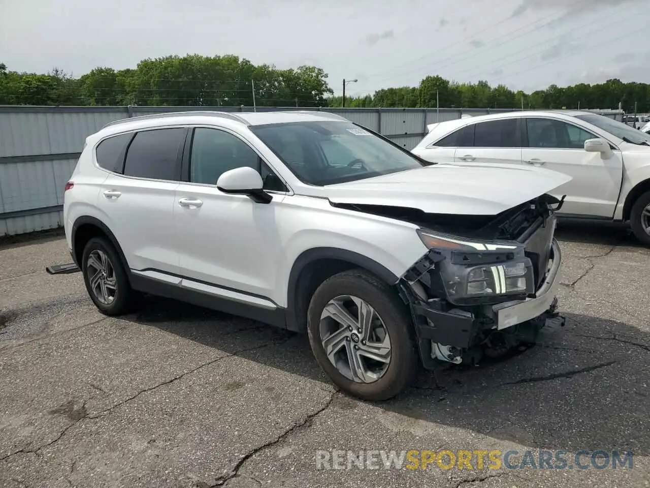 4 Photograph of a damaged car 5NMS2DAJ9MH310574 HYUNDAI SANTA FE 2021
