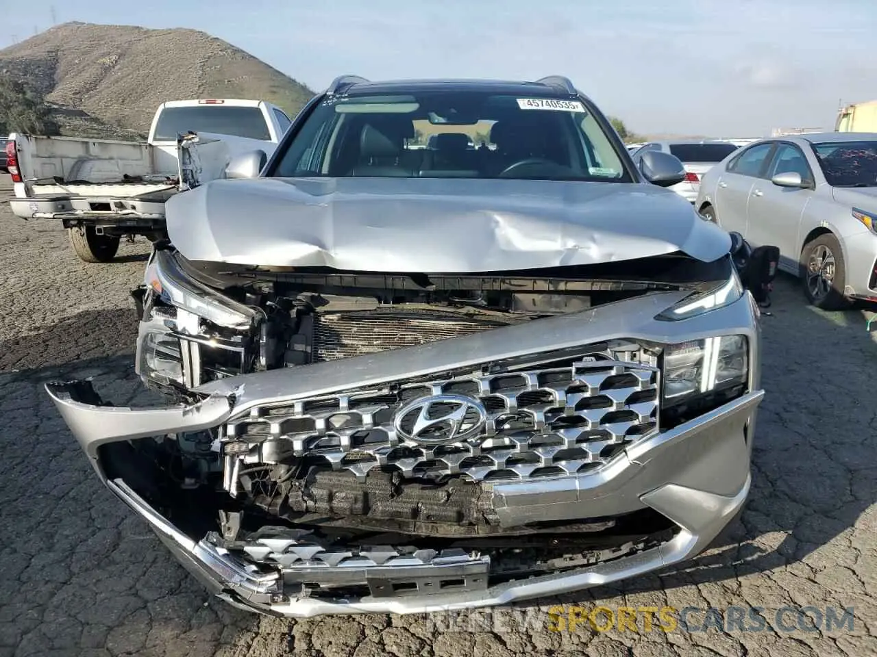 5 Photograph of a damaged car 5NMS34AJ5MH321004 HYUNDAI SANTA FE 2021