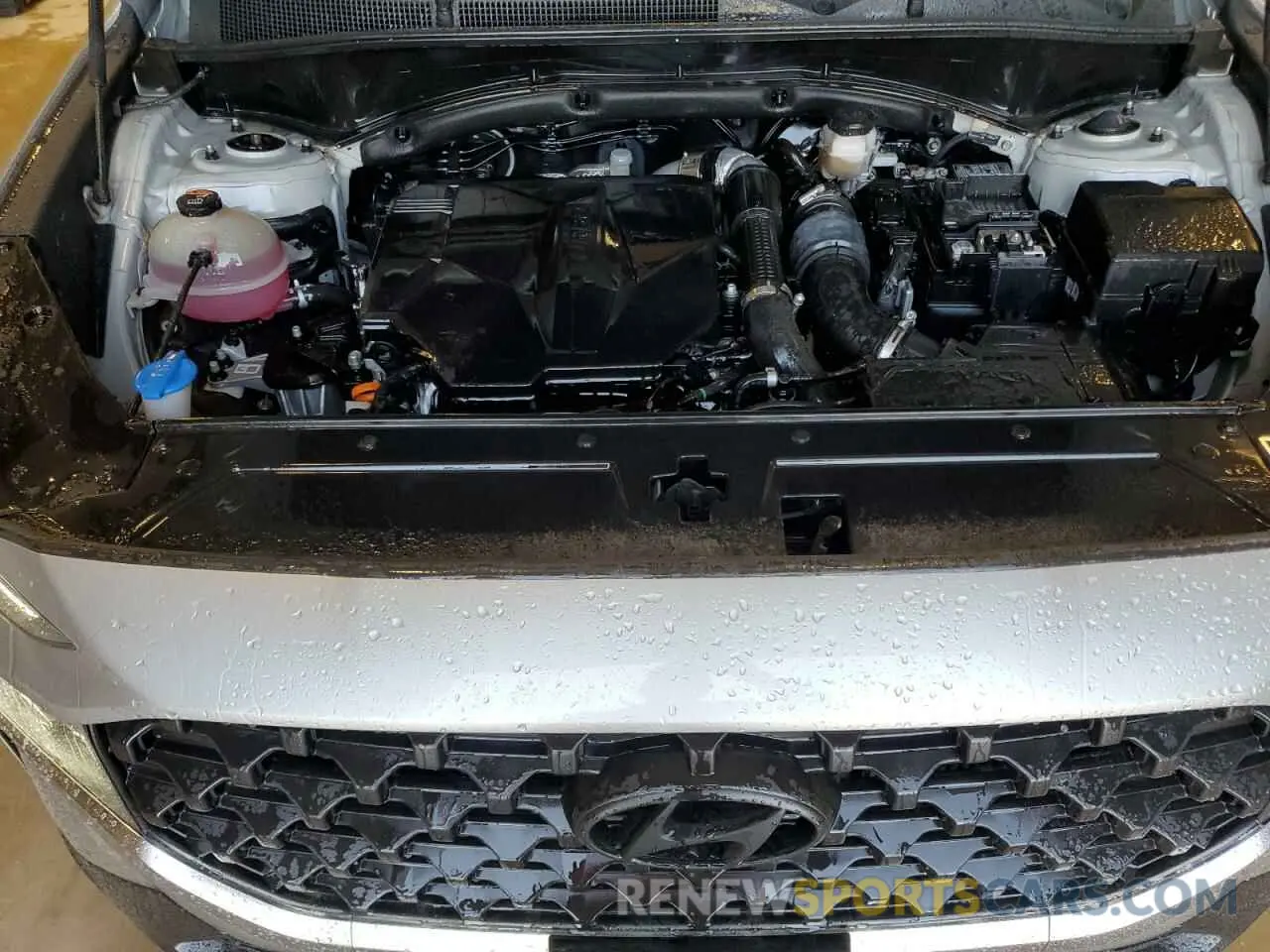 12 Photograph of a damaged car 5NMS44AL6MH334925 HYUNDAI SANTA FE 2021