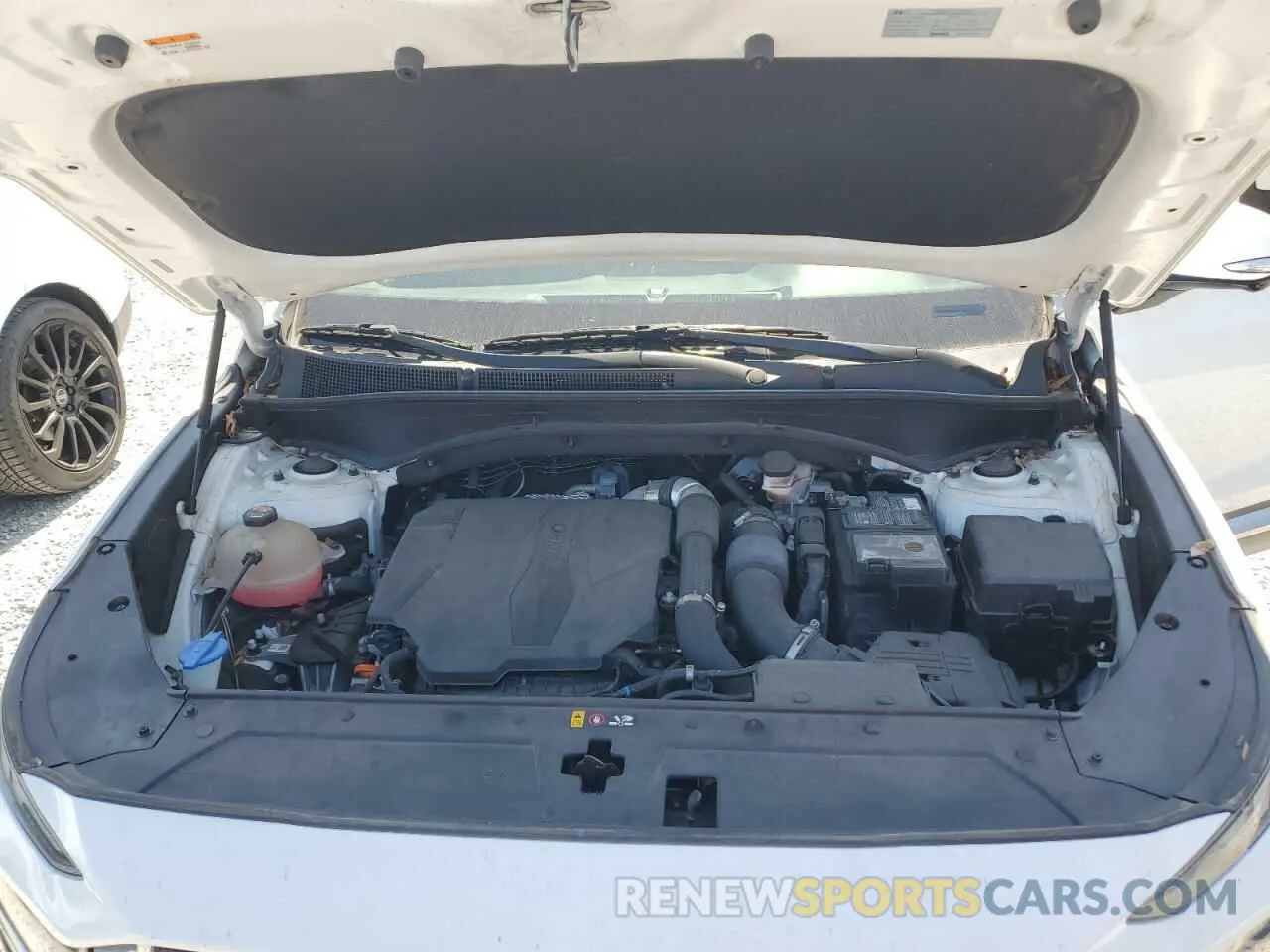 12 Photograph of a damaged car 5NMS44AL8MH315390 HYUNDAI SANTA FE 2021