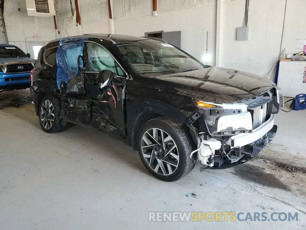 4 Photograph of a damaged car 5NMS54AL0NH457134 HYUNDAI SANTA FE 2022