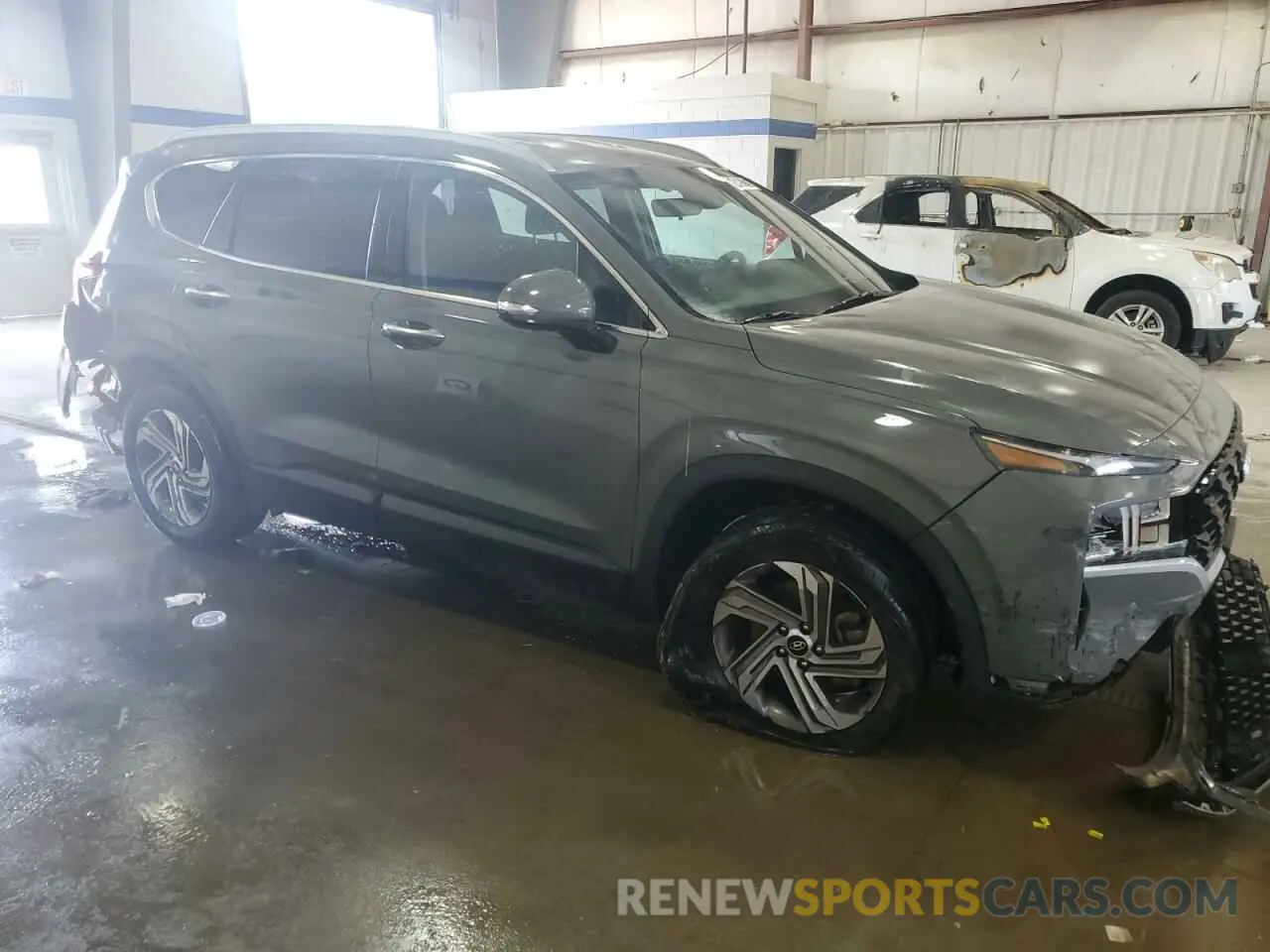 4 Photograph of a damaged car 5NMS24AJ1PH571721 HYUNDAI SANTA FE 2023