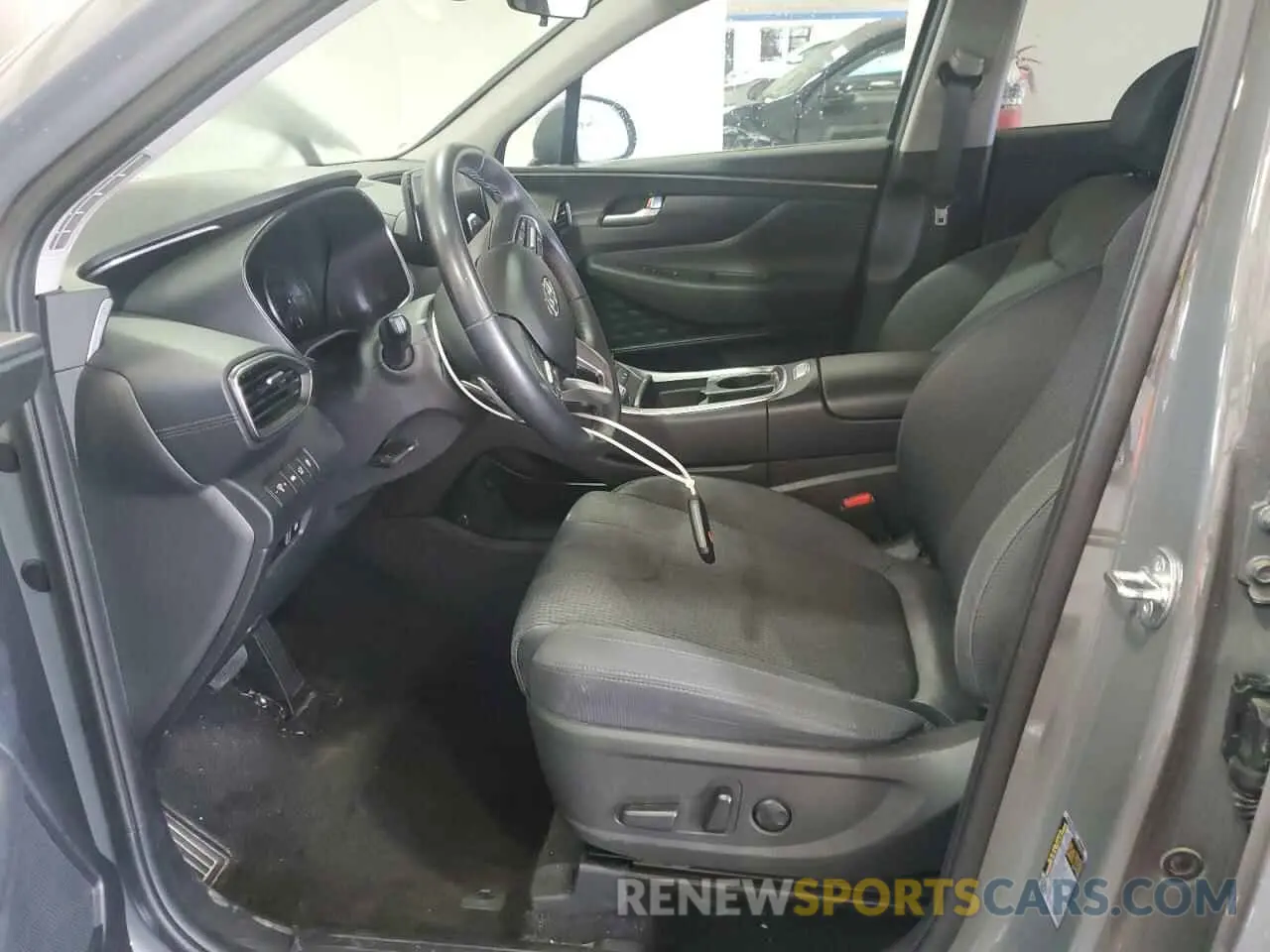 7 Photograph of a damaged car 5NMS24AJ1PH571721 HYUNDAI SANTA FE 2023