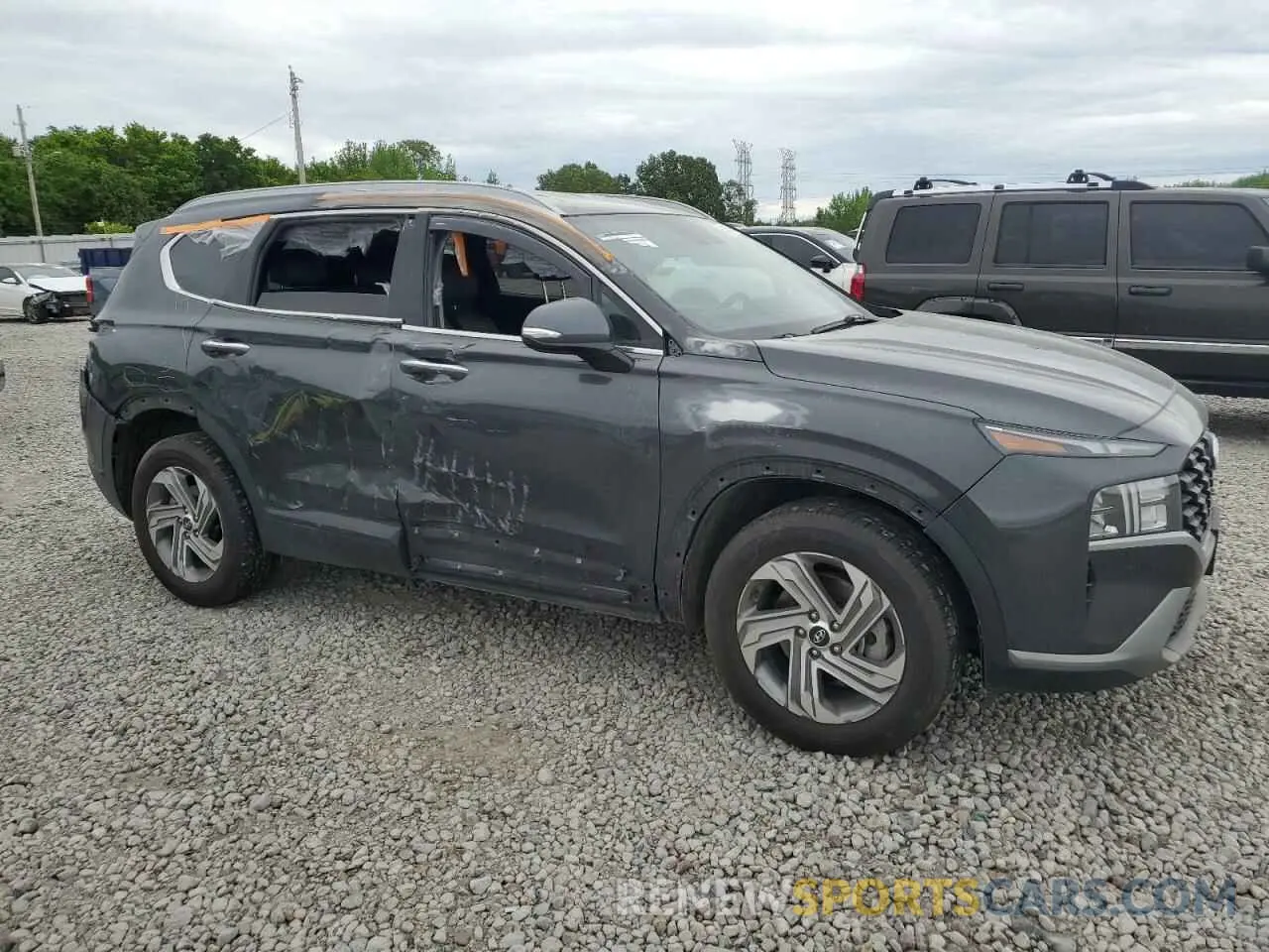 4 Photograph of a damaged car 5NMS24AJ2PH528022 HYUNDAI SANTA FE 2023