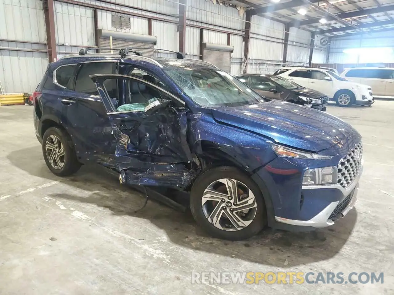 4 Photograph of a damaged car 5NMS34AJ7PH577195 HYUNDAI SANTA FE 2023