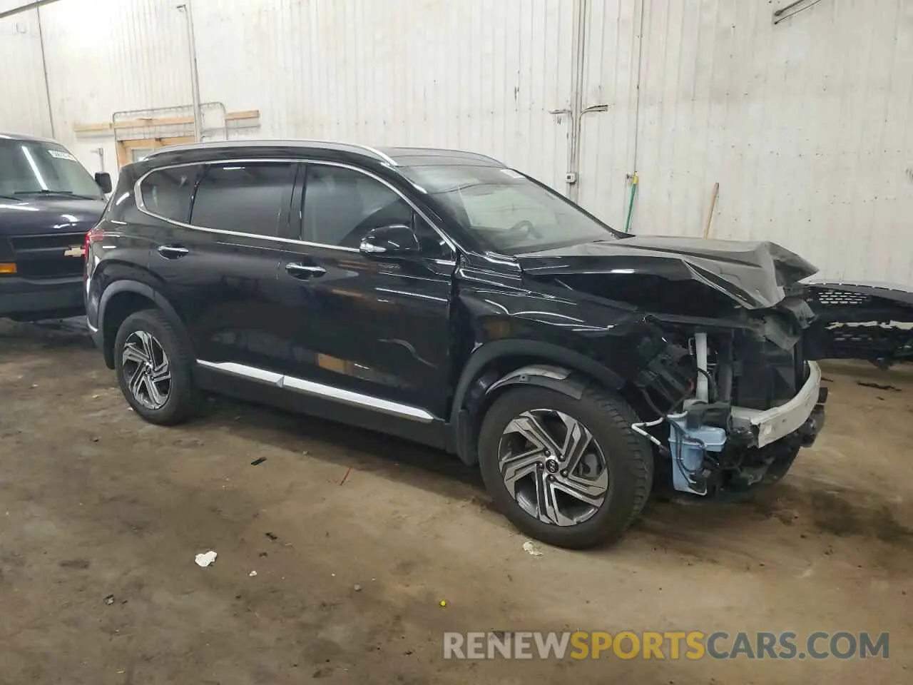 4 Photograph of a damaged car 5NMS3DAJ7PH501525 HYUNDAI SANTA FE 2023