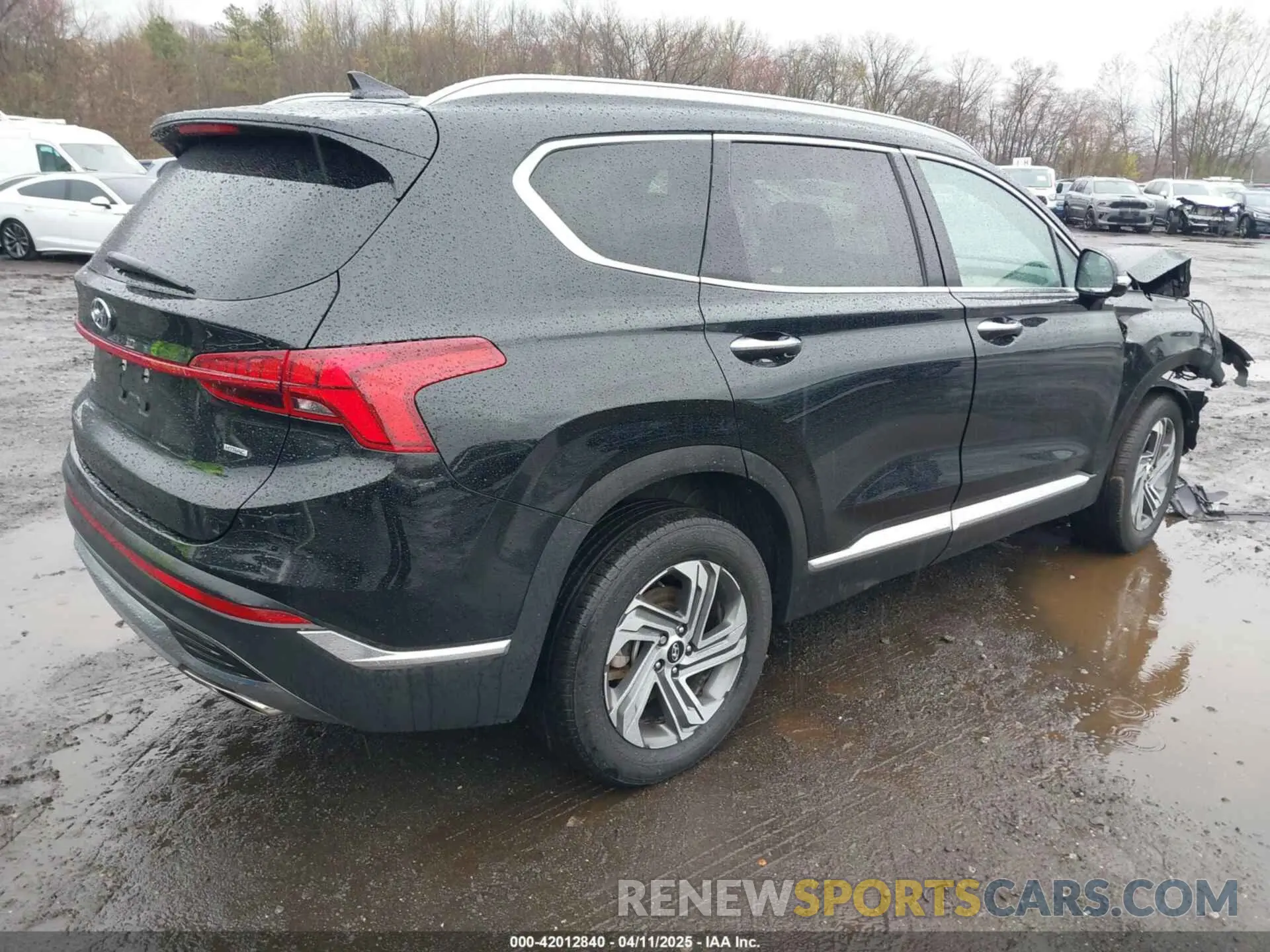 4 Photograph of a damaged car 5NMS3DAJ9PH631371 HYUNDAI SANTA FE 2023