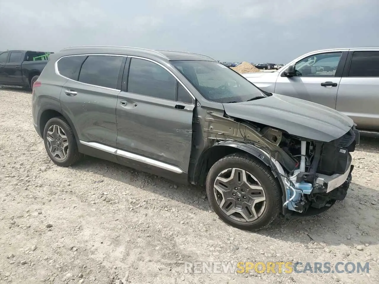 4 Photograph of a damaged car 5NMS44AL9PH568500 HYUNDAI SANTA FE 2023
