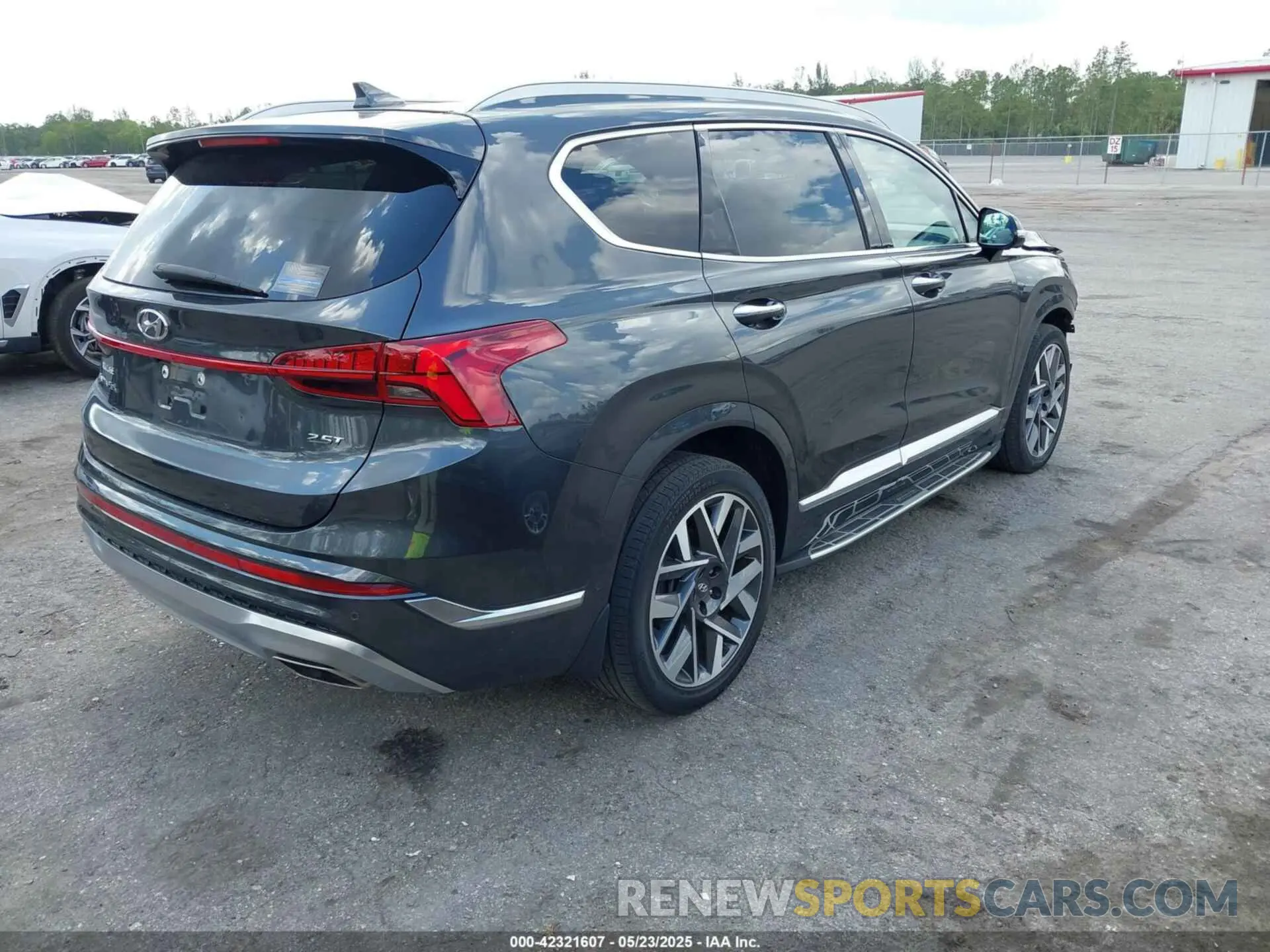 4 Photograph of a damaged car 5NMS54AL1PH492283 HYUNDAI SANTA FE 2023