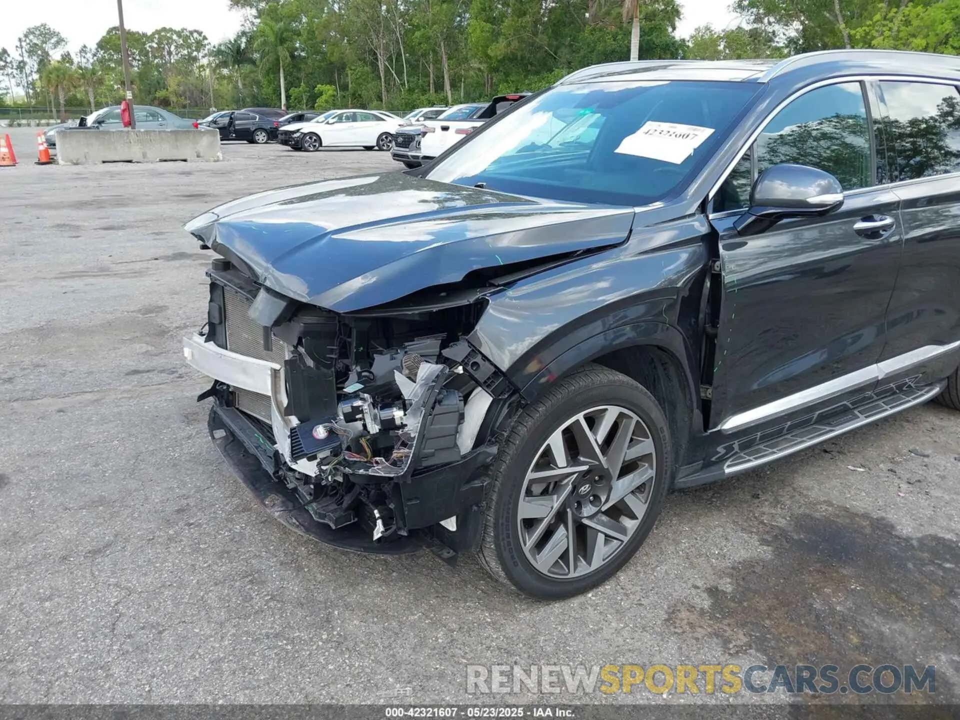 6 Photograph of a damaged car 5NMS54AL1PH492283 HYUNDAI SANTA FE 2023