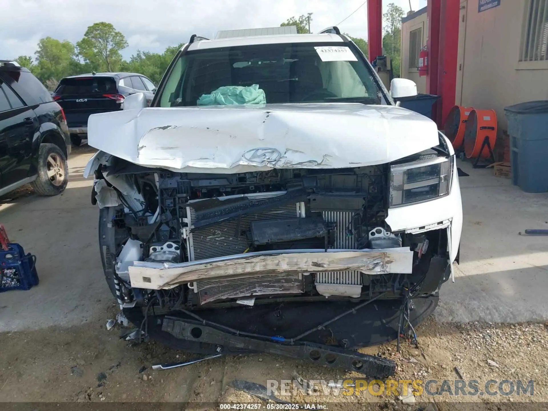 12 Photograph of a damaged car 5NMP44GL1RH029384 HYUNDAI SANTA FE 2024