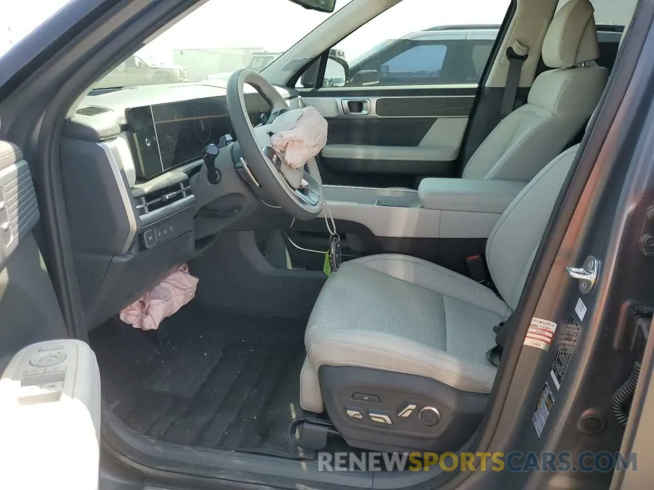 7 Photograph of a damaged car 5NMP5DGL6RH059140 HYUNDAI SANTA FE 2024