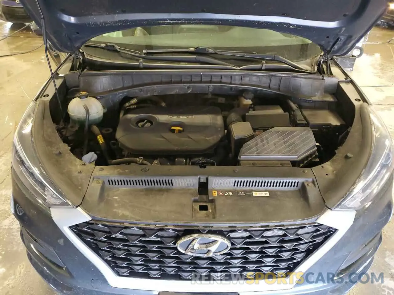 12 Photograph of a damaged car KM8J2CA49KU937731 HYUNDAI TUCSON 2019