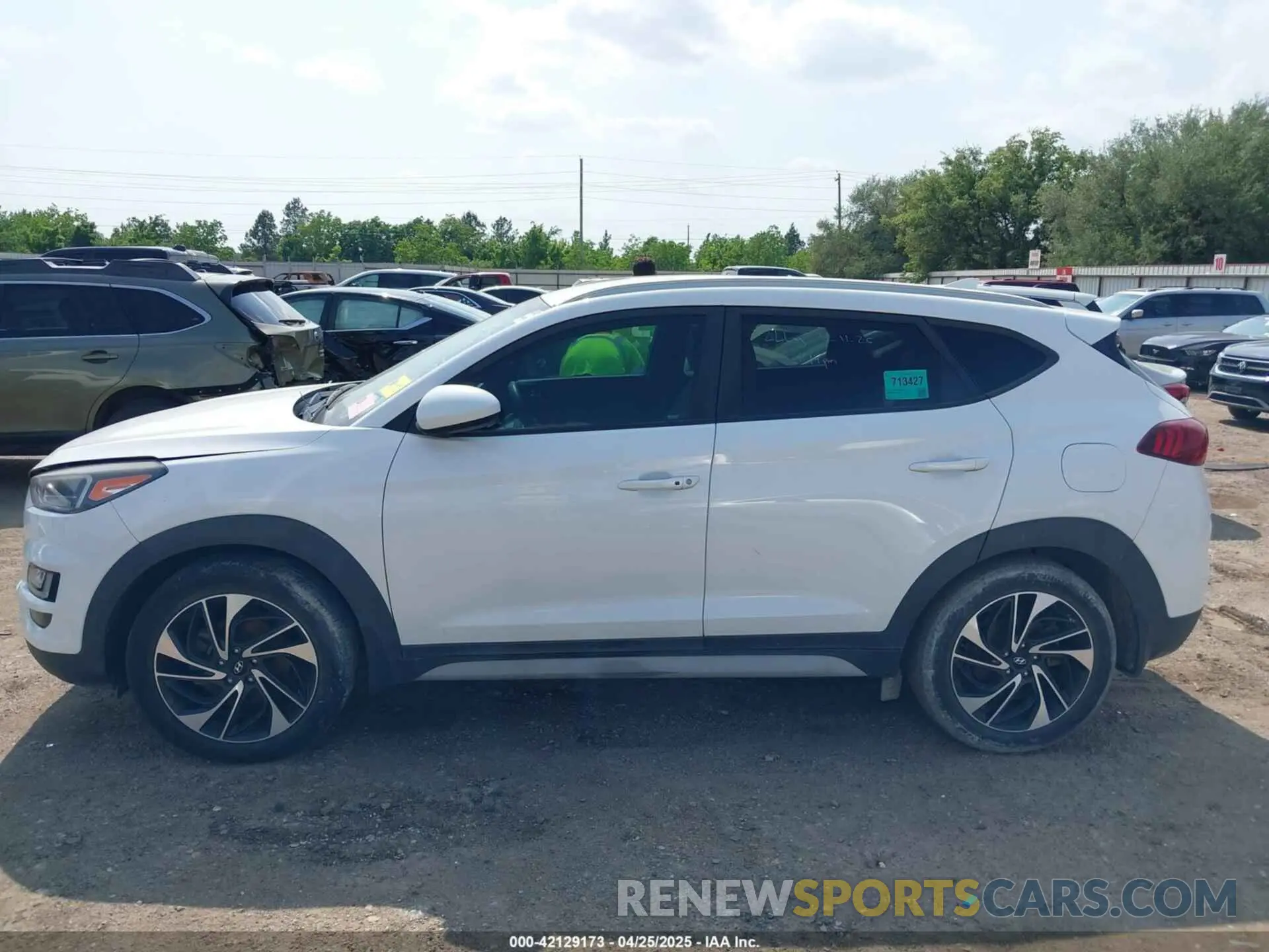 14 Photograph of a damaged car KM8J33AL1KU861698 HYUNDAI TUCSON 2019