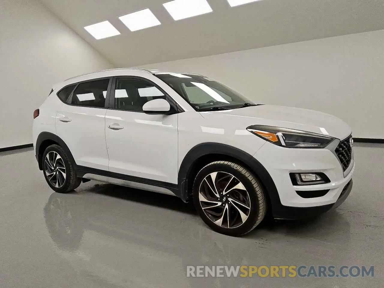 4 Photograph of a damaged car KM8J33AL3KU874095 HYUNDAI TUCSON 2019