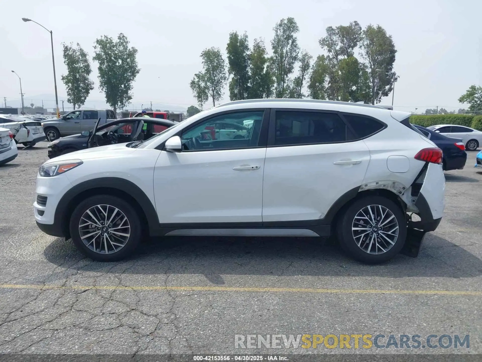 14 Photograph of a damaged car KM8J33AL5KU021603 HYUNDAI TUCSON 2019
