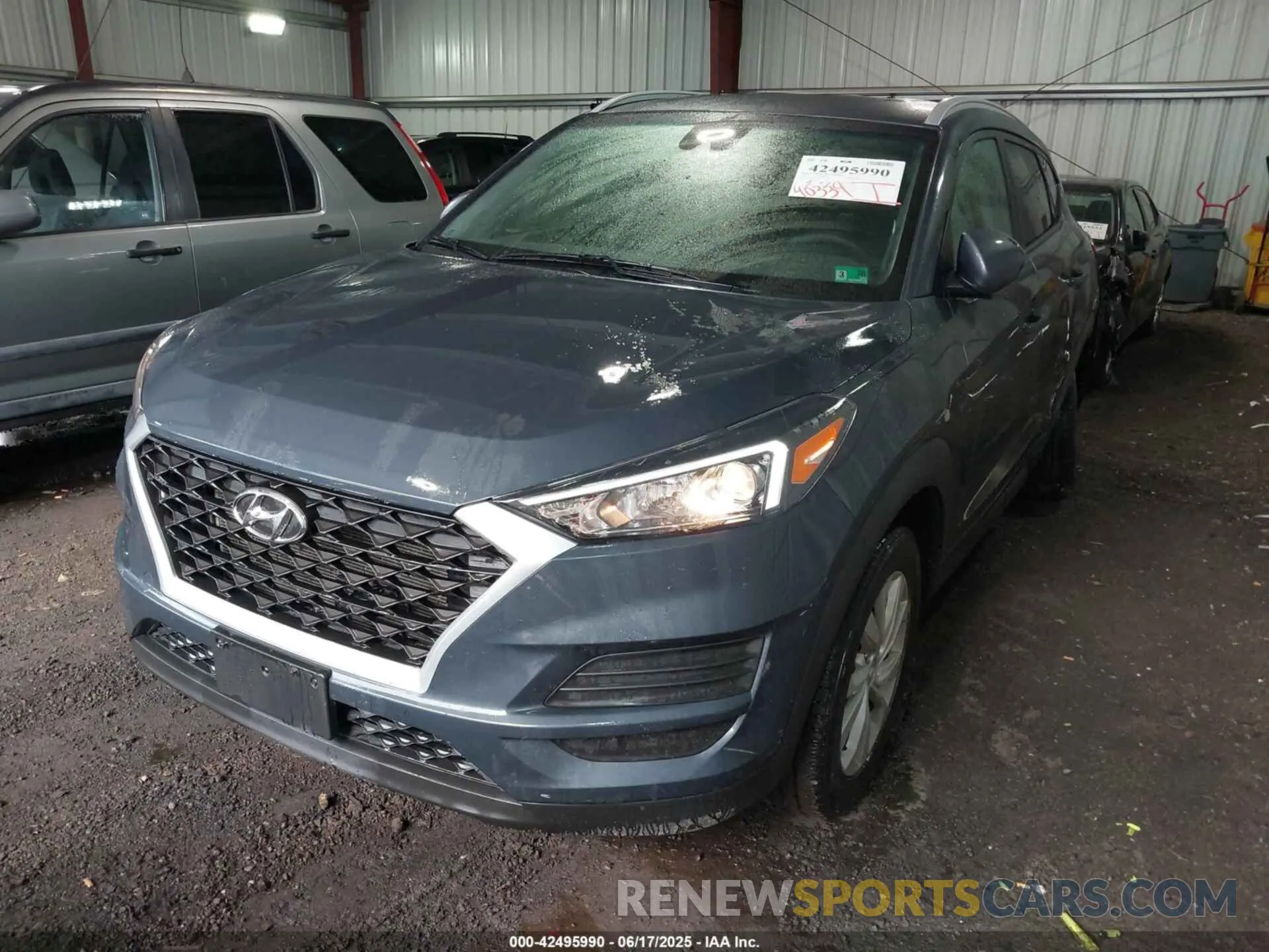 2 Photograph of a damaged car KM8J33A43MU401342 HYUNDAI TUCSON 2021