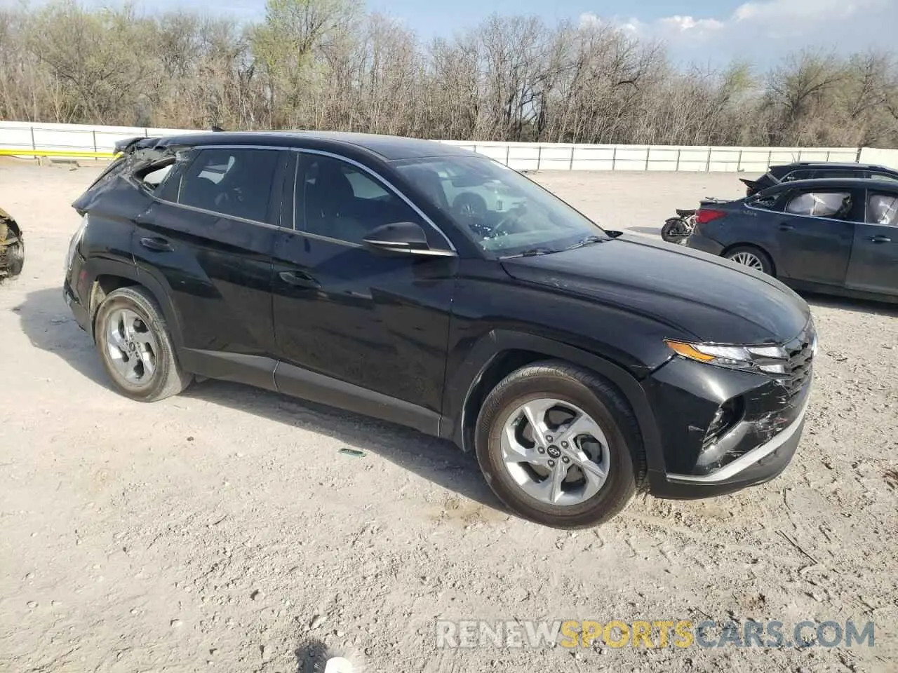 4 Photograph of a damaged car 5NMJA3AE4NH087888 HYUNDAI TUCSON 2022