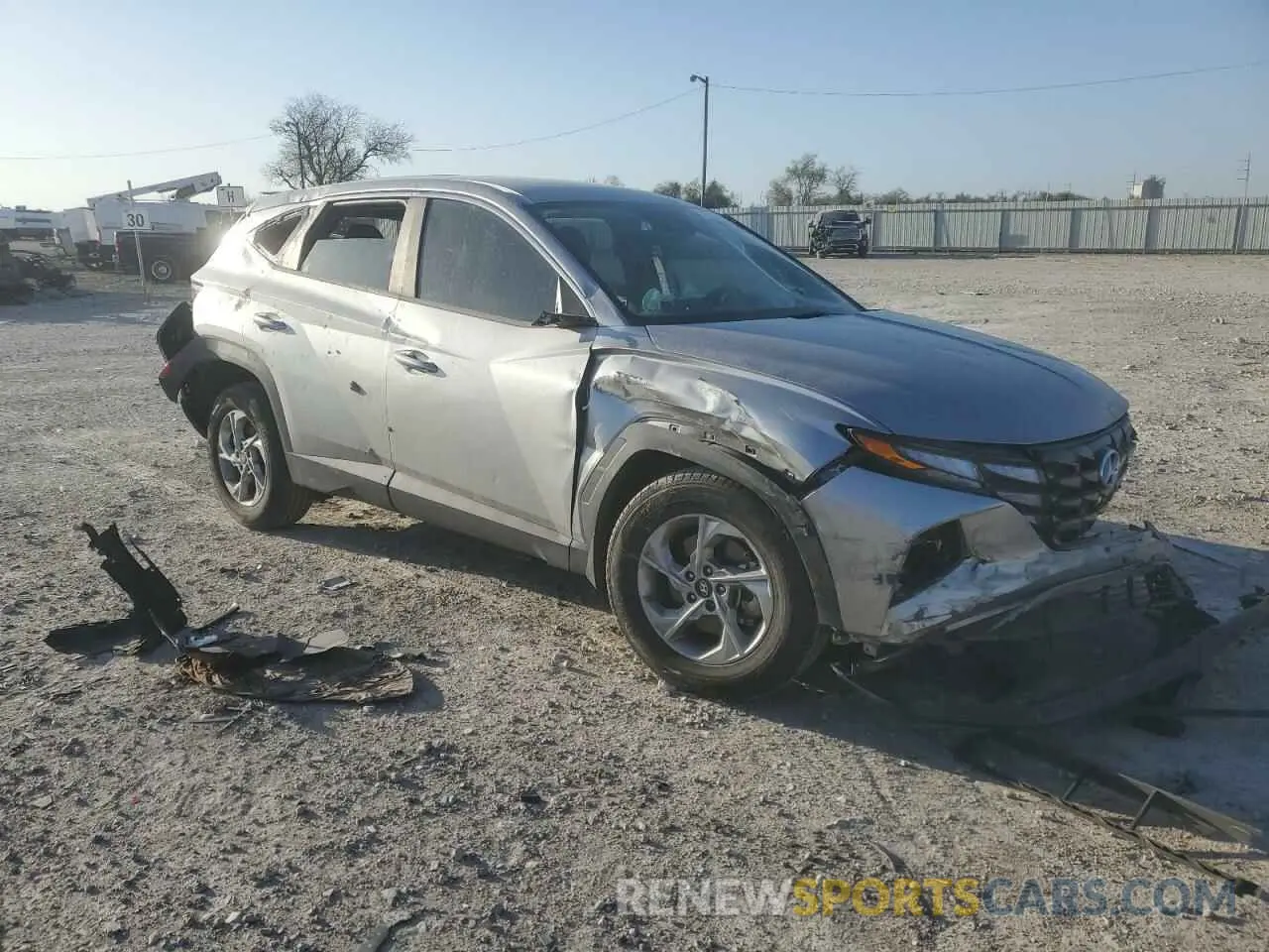 4 Photograph of a damaged car 5NMJA3AE6NH026428 HYUNDAI TUCSON 2022