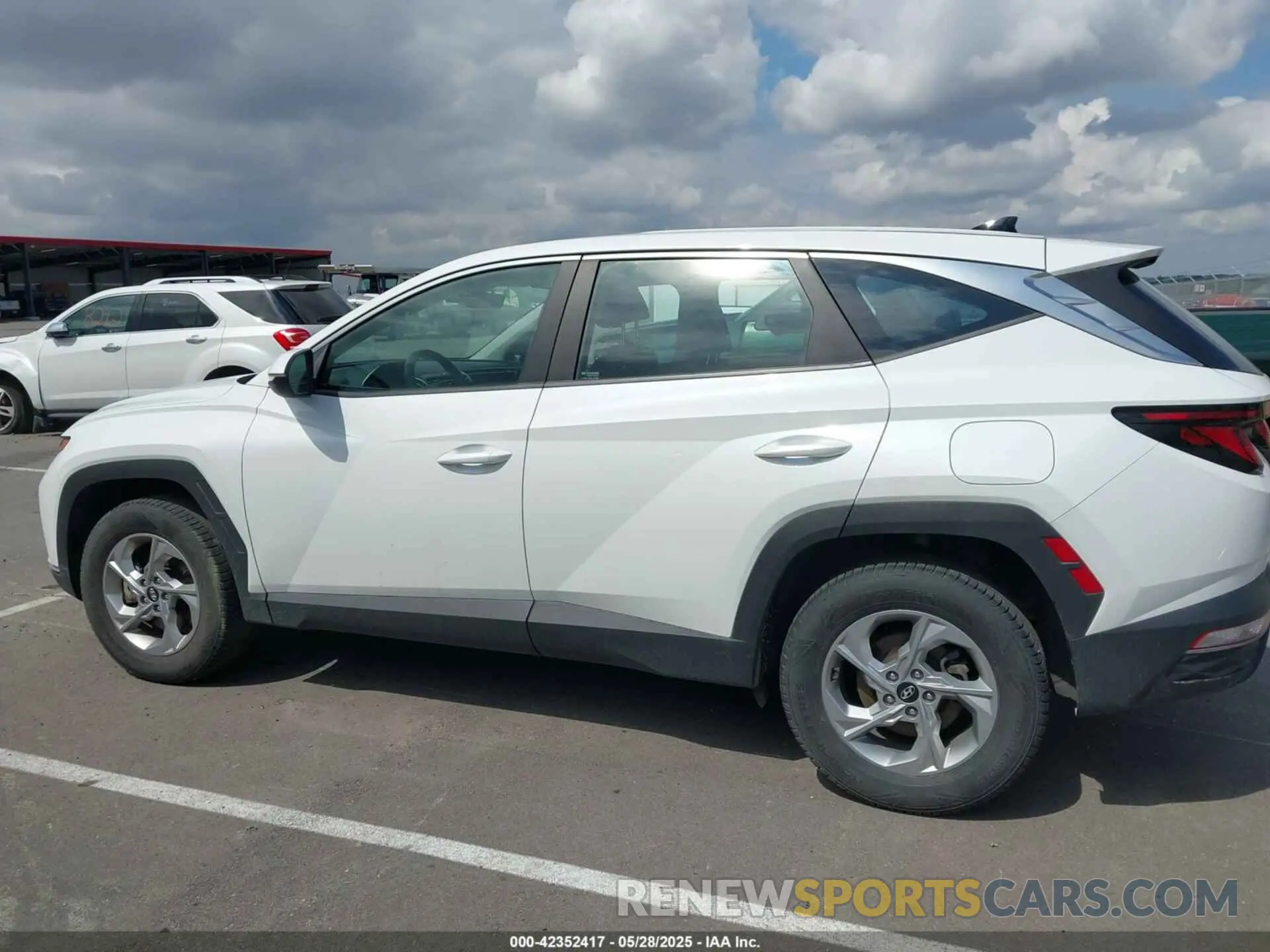 14 Photograph of a damaged car 5NMJACAE1NH079814 HYUNDAI TUCSON 2022