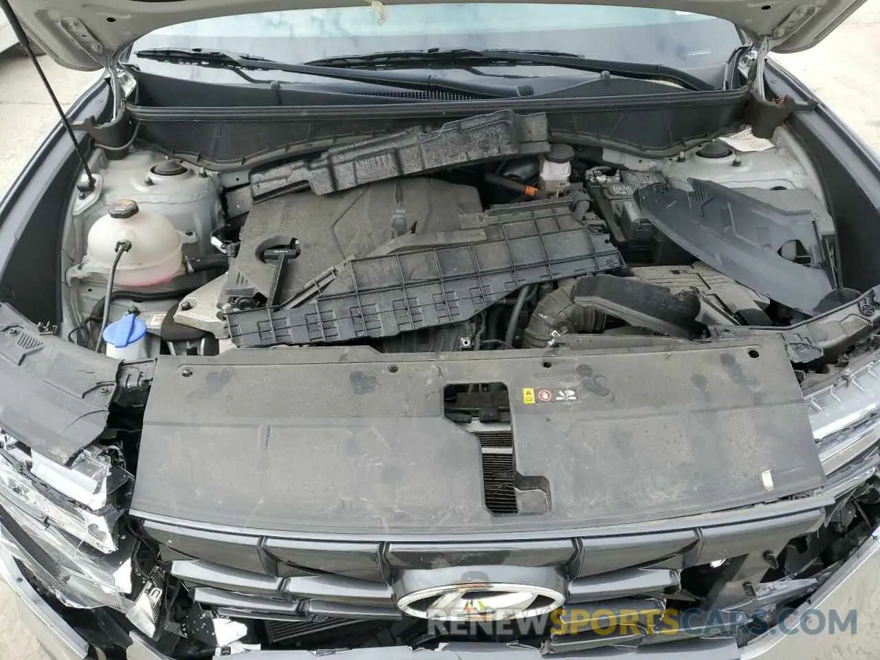 12 Photograph of a damaged car 5NMJACAE1NH094491 HYUNDAI TUCSON 2022