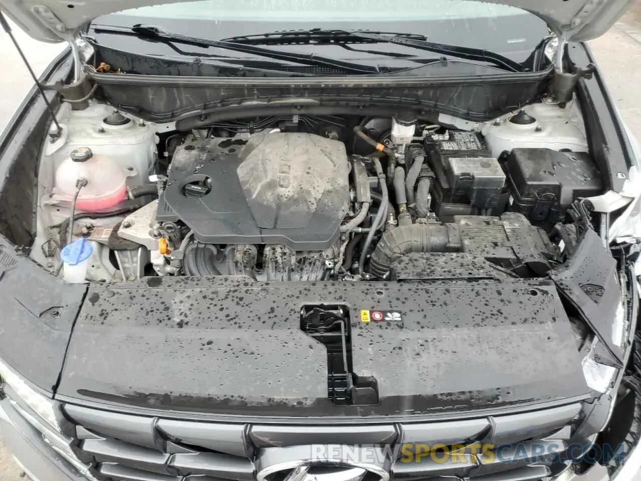 12 Photograph of a damaged car 5NMJACAE5NH144891 HYUNDAI TUCSON 2022