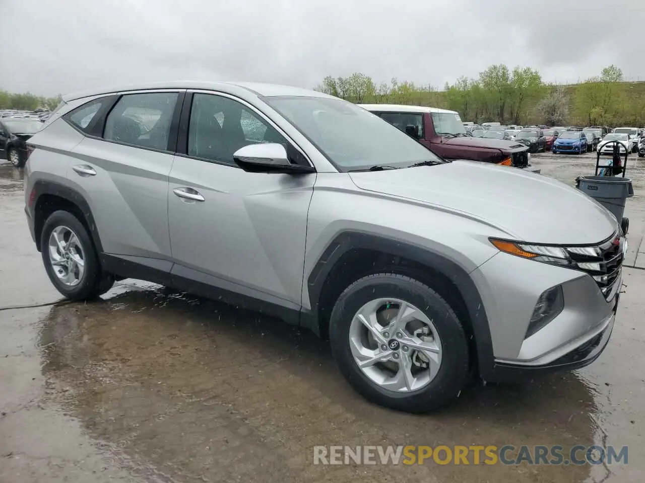 4 Photograph of a damaged car 5NMJACAE5NH144891 HYUNDAI TUCSON 2022