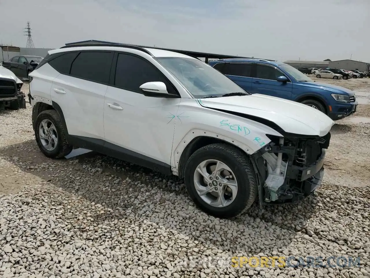 4 Photograph of a damaged car 5NMJB3AE2NH141458 HYUNDAI TUCSON 2022