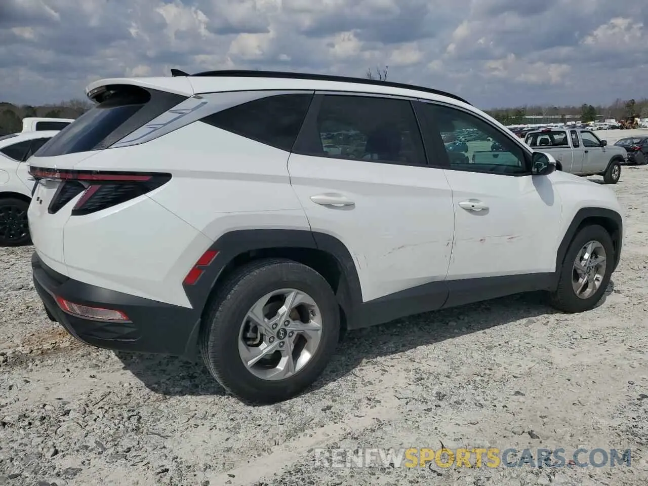 3 Photograph of a damaged car 5NMJB3AE9NH142364 HYUNDAI TUCSON 2022
