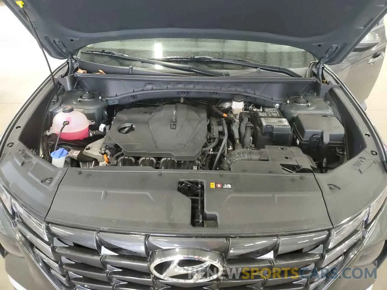 12 Photograph of a damaged car 5NMJBCAE0NH040094 HYUNDAI TUCSON 2022
