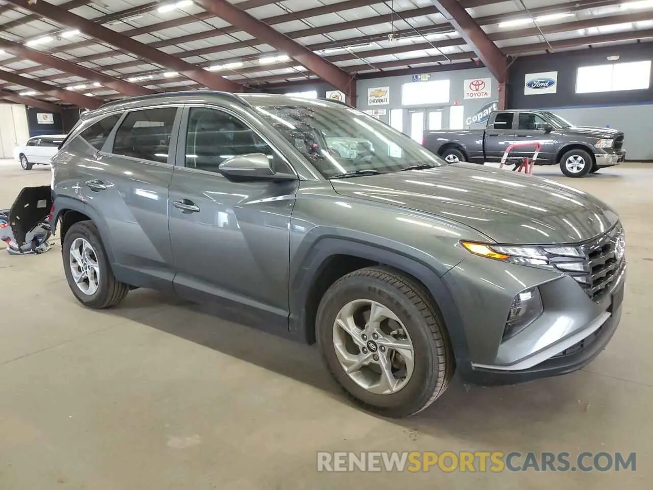 4 Photograph of a damaged car 5NMJBCAE0NH040094 HYUNDAI TUCSON 2022