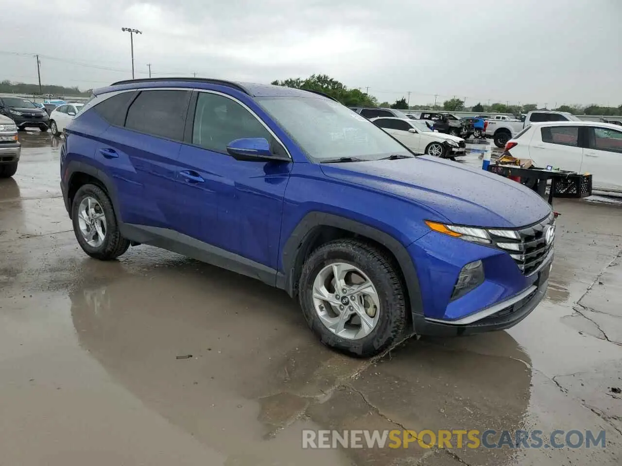 4 Photograph of a damaged car 5NMJBCAE0NH118339 HYUNDAI TUCSON 2022