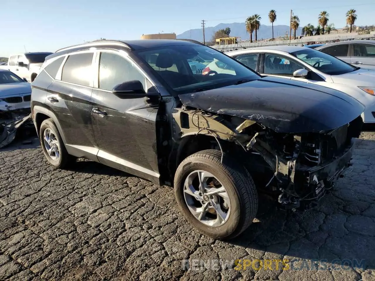 4 Photograph of a damaged car 5NMJBCAE5NH121754 HYUNDAI TUCSON 2022