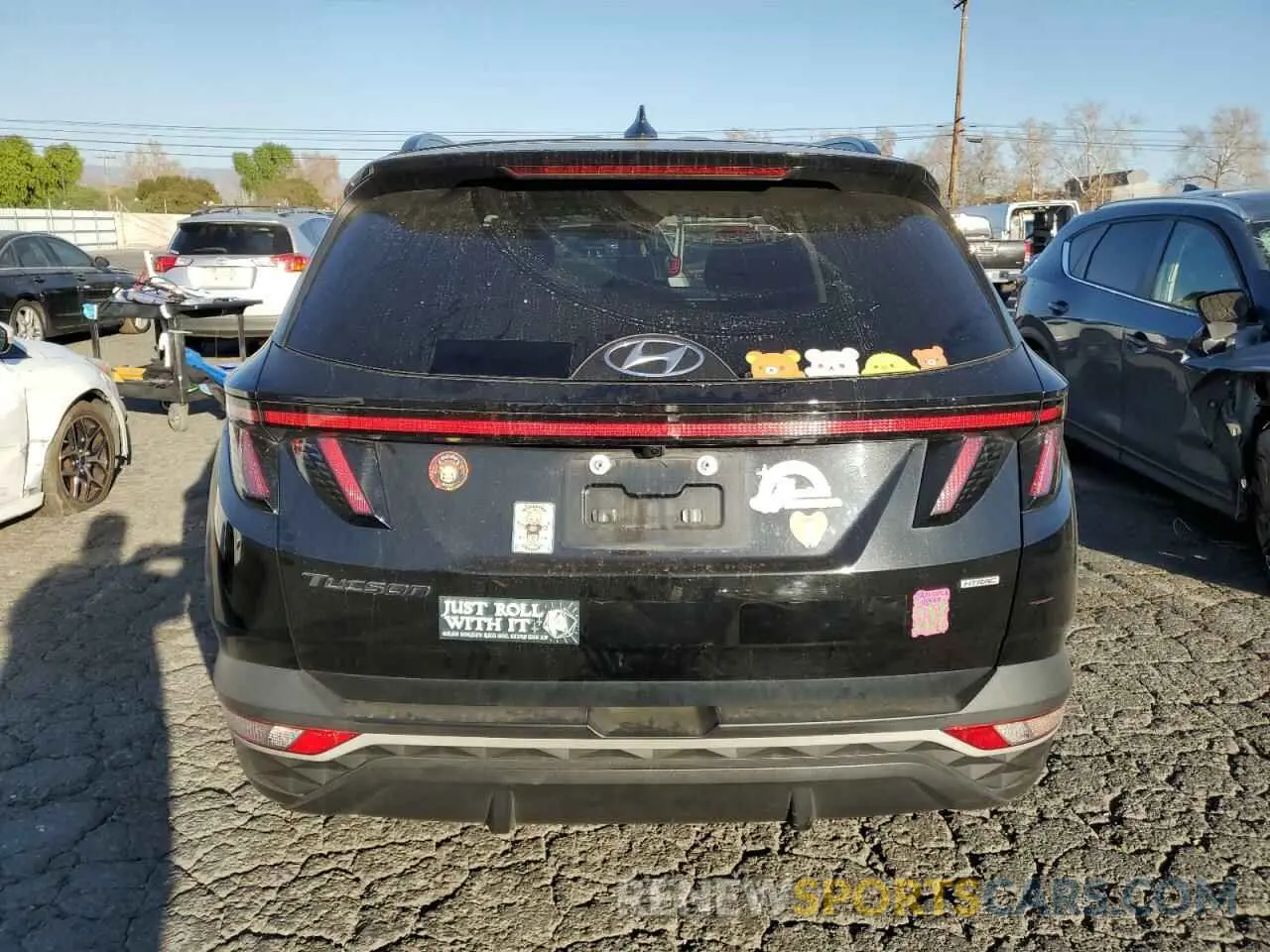 6 Photograph of a damaged car 5NMJBCAE5NH121754 HYUNDAI TUCSON 2022