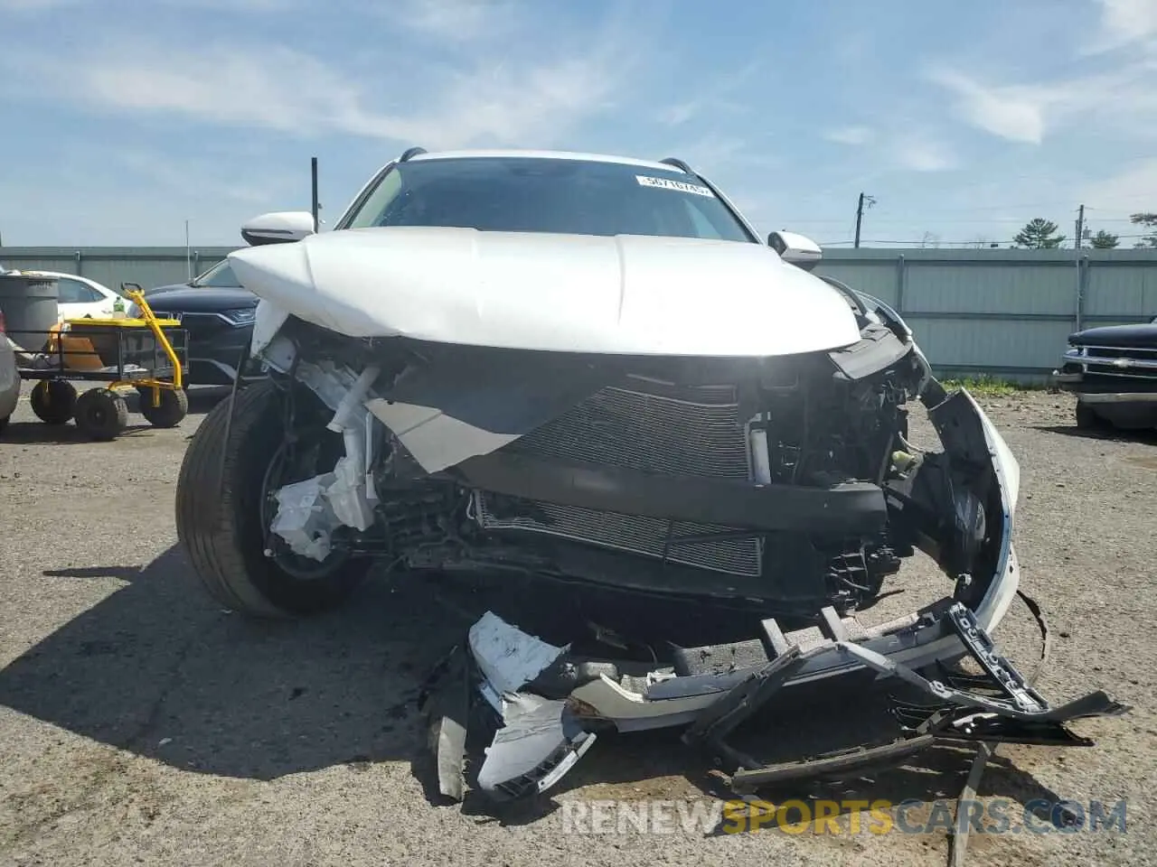 5 Photograph of a damaged car 5NMJBCAE6NH097898 HYUNDAI TUCSON 2022