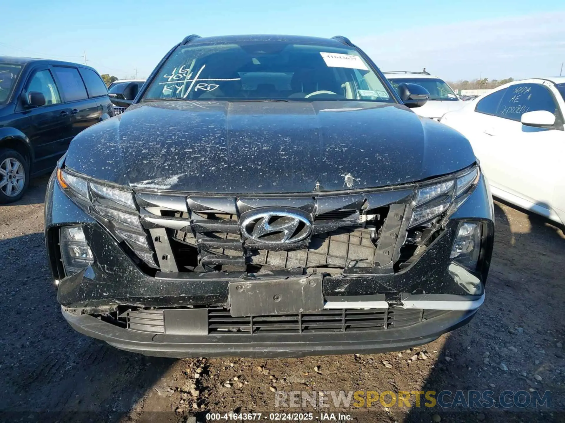 12 Photograph of a damaged car 5NMJBCAE7NH094704 HYUNDAI TUCSON 2022