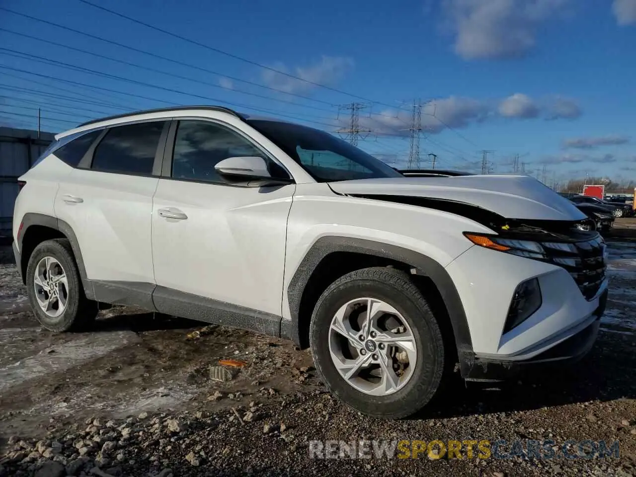4 Photograph of a damaged car 5NMJBCAE9NH160038 HYUNDAI TUCSON 2022