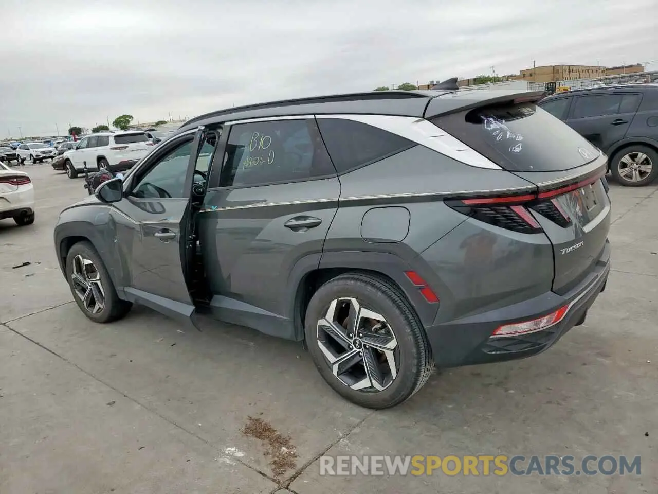 2 Photograph of a damaged car 5NMJC3AE0NH062075 HYUNDAI TUCSON 2022