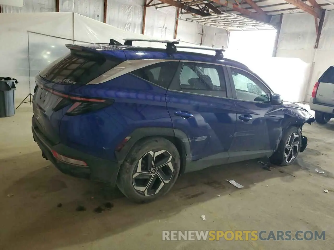 3 Photograph of a damaged car 5NMJC3AE1NH052090 HYUNDAI TUCSON 2022