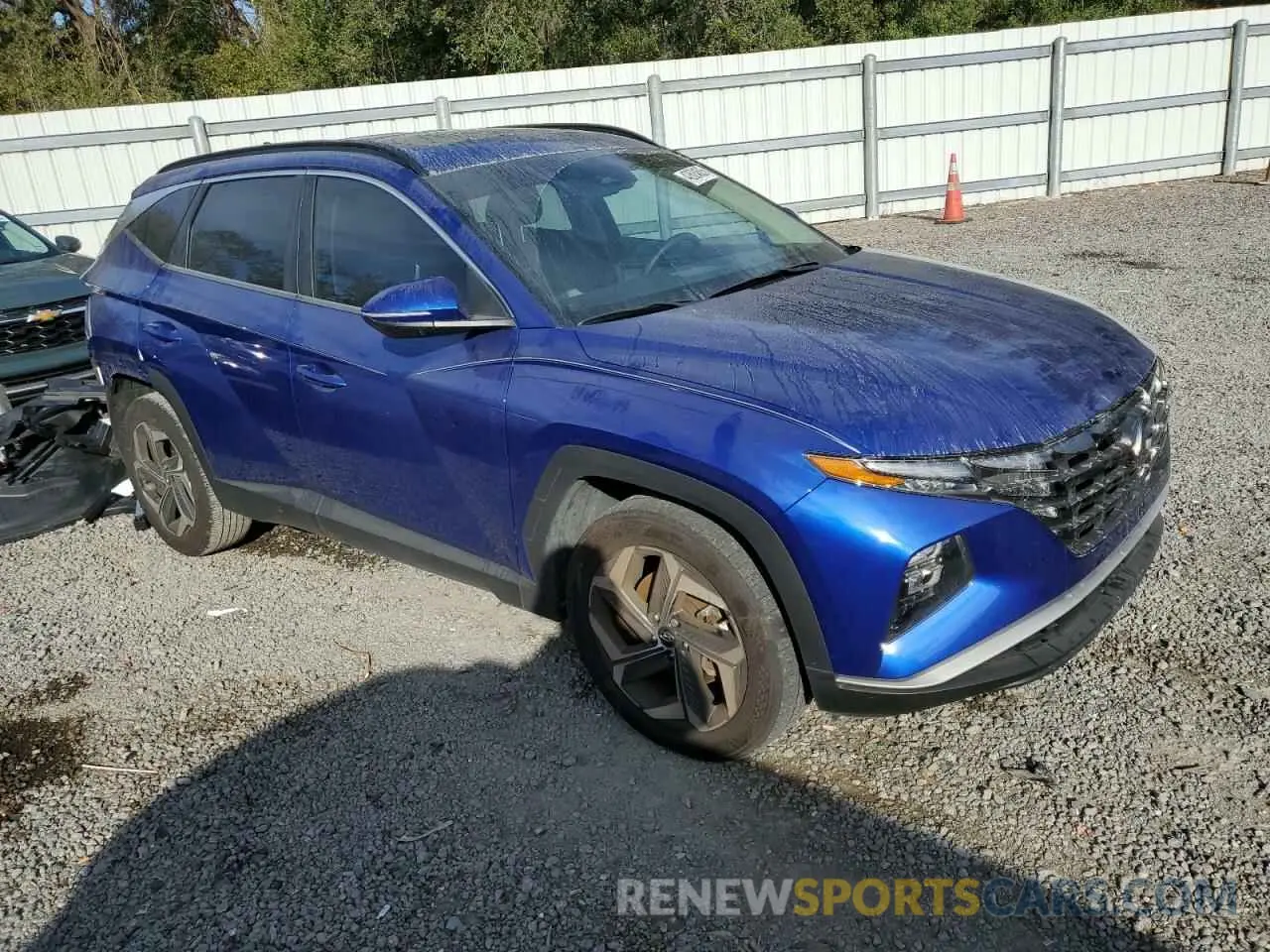 4 Photograph of a damaged car 5NMJC3AE2NH004405 HYUNDAI TUCSON 2022