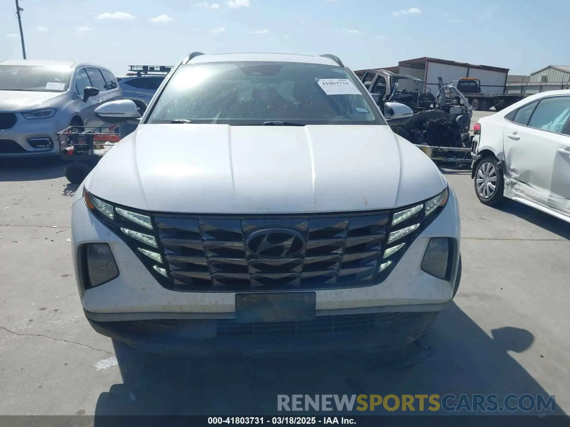 12 Photograph of a damaged car 5NMJC3AE2NH126472 HYUNDAI TUCSON 2022
