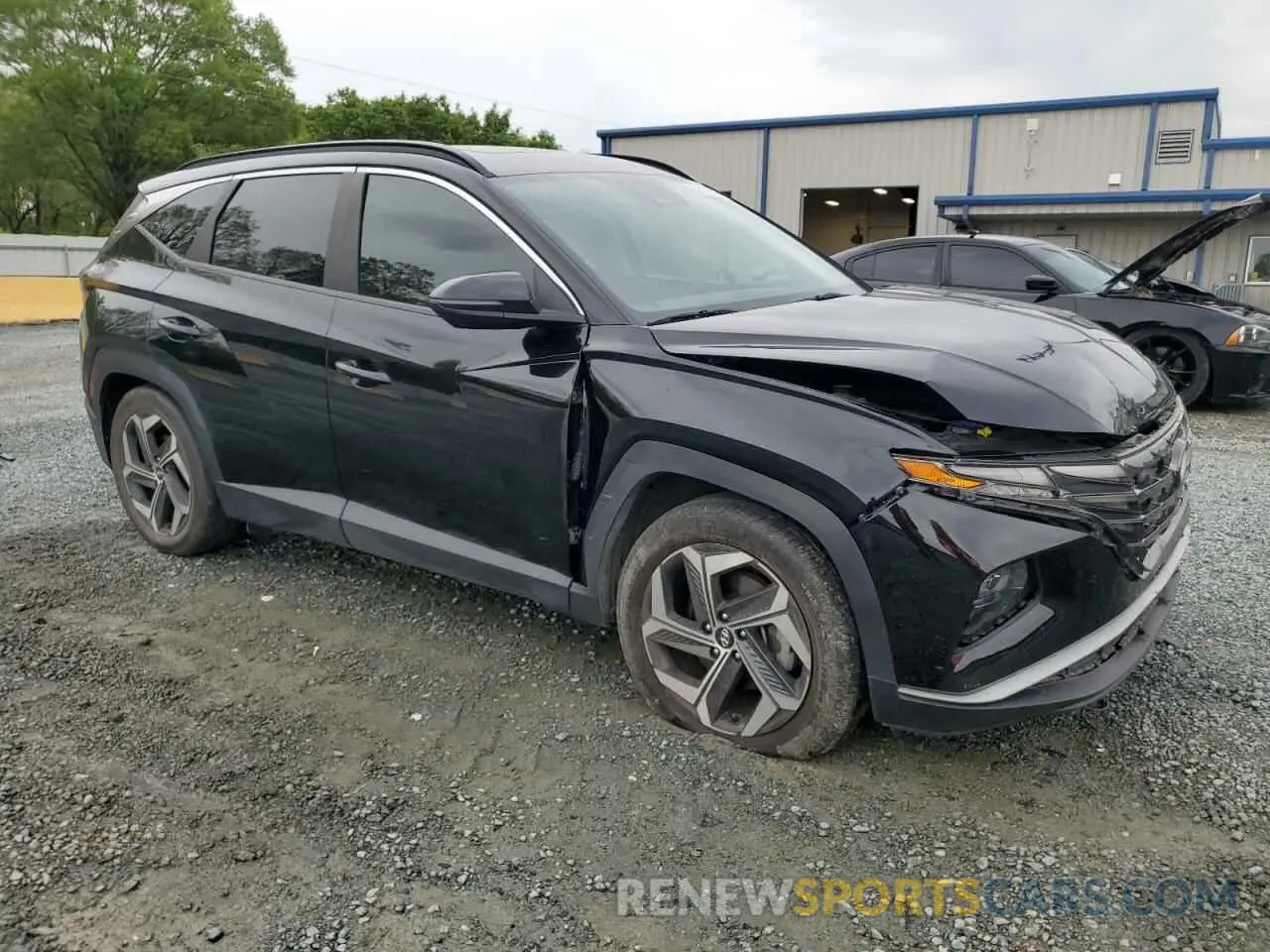 4 Photograph of a damaged car 5NMJC3AE3NH011413 HYUNDAI TUCSON 2022