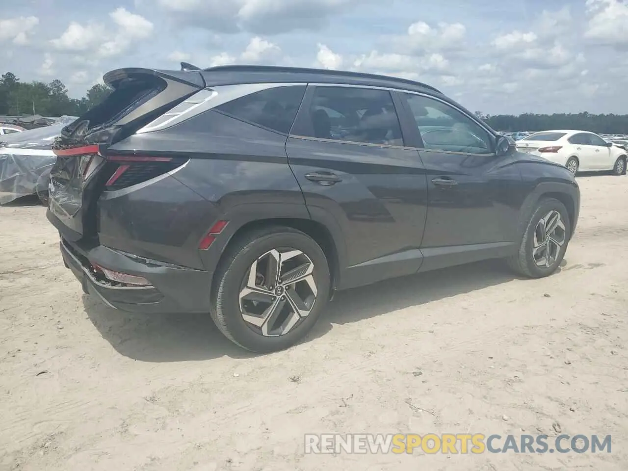 3 Photograph of a damaged car 5NMJC3AE5NH012112 HYUNDAI TUCSON 2022