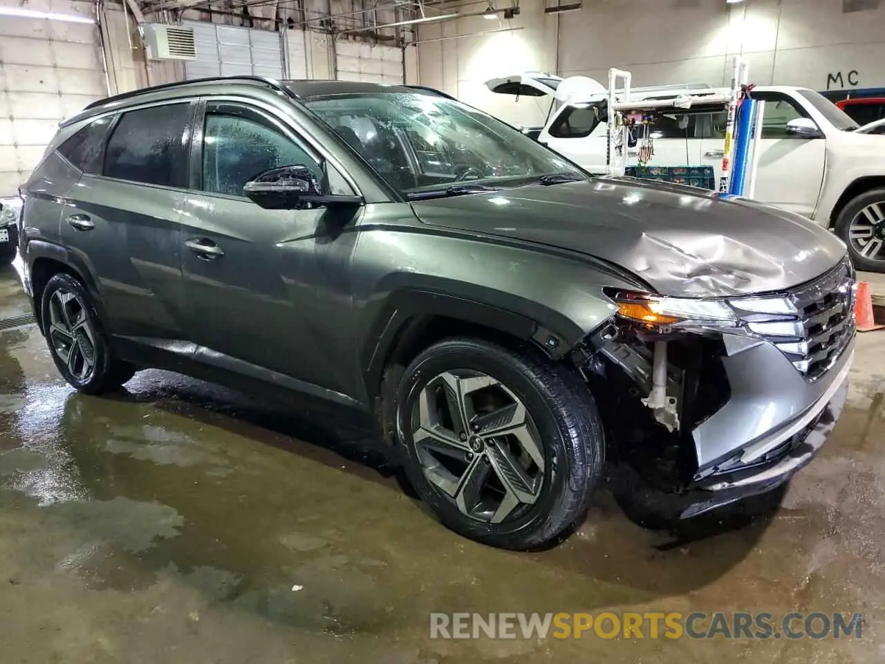 4 Photograph of a damaged car 5NMJC3AE5NH043053 HYUNDAI TUCSON 2022