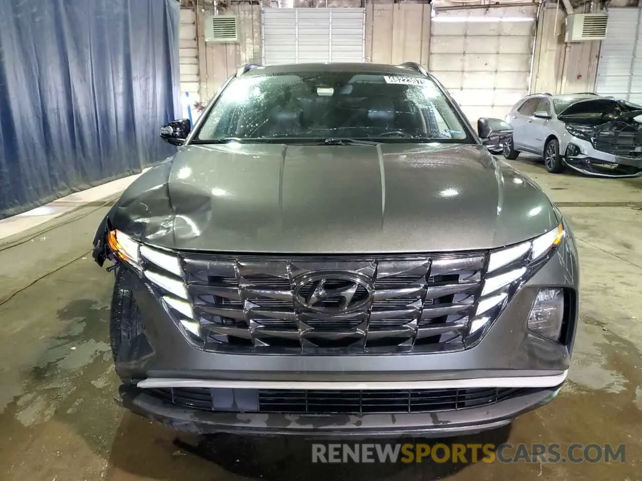5 Photograph of a damaged car 5NMJC3AE5NH043053 HYUNDAI TUCSON 2022