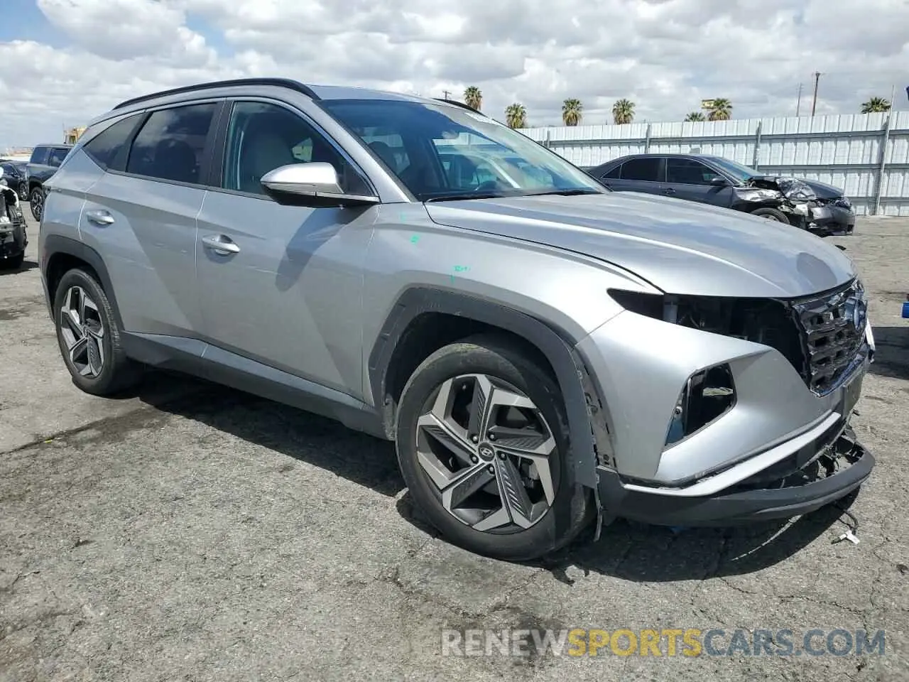 4 Photograph of a damaged car 5NMJC3AE6NH039674 HYUNDAI TUCSON 2022